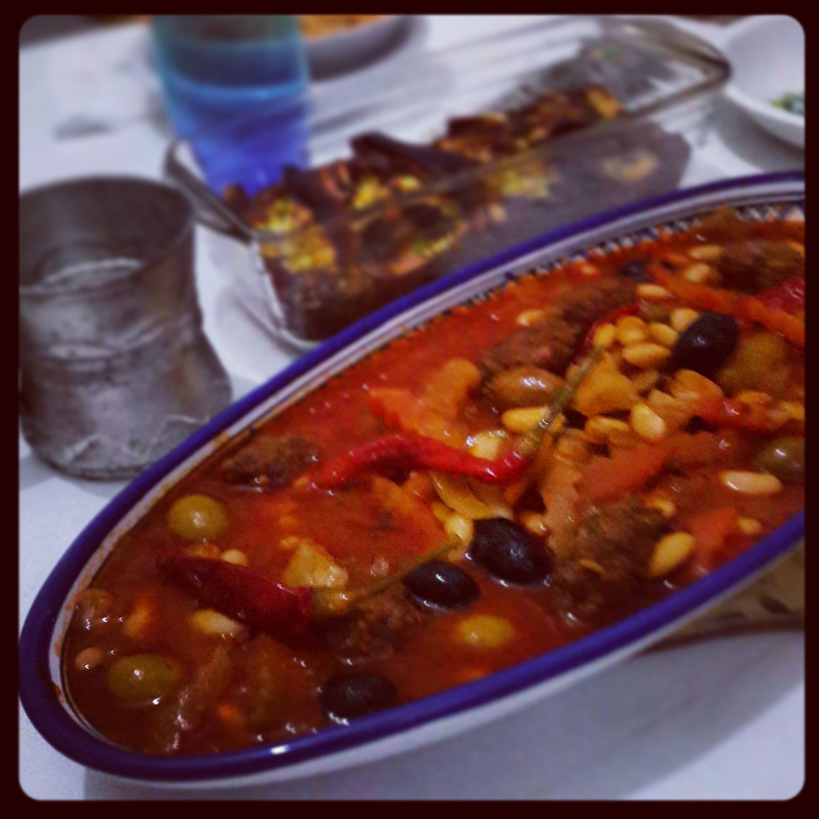 Loubia, Moroccan white bean stew in tomato sauce with olives