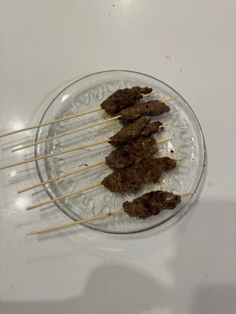 Grilled kefta skewers on a plate