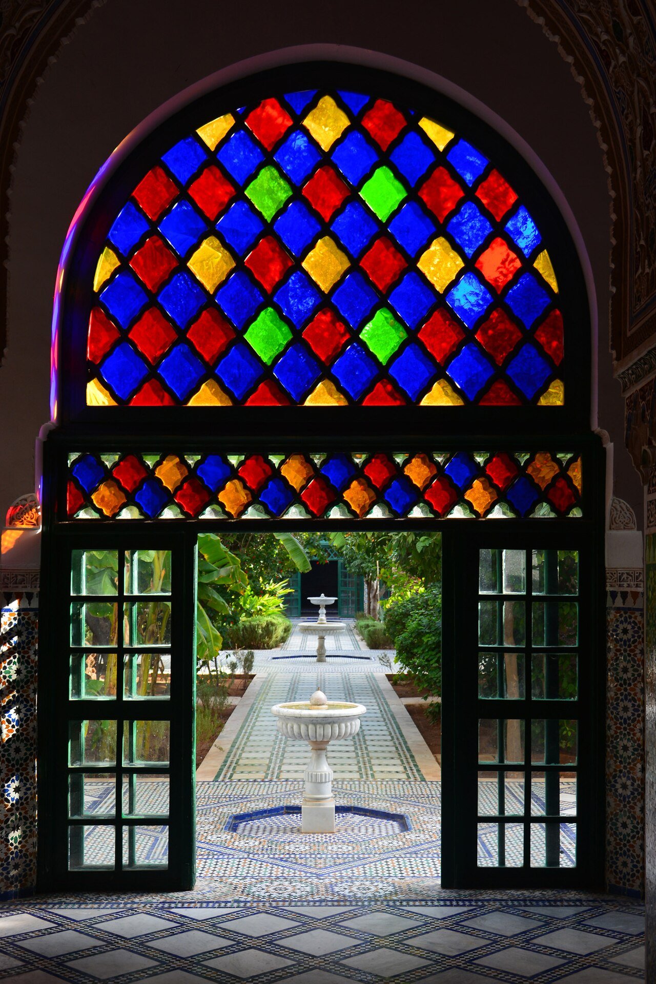 Riad-style interior courtyard with fountain and tilework in Marrakech