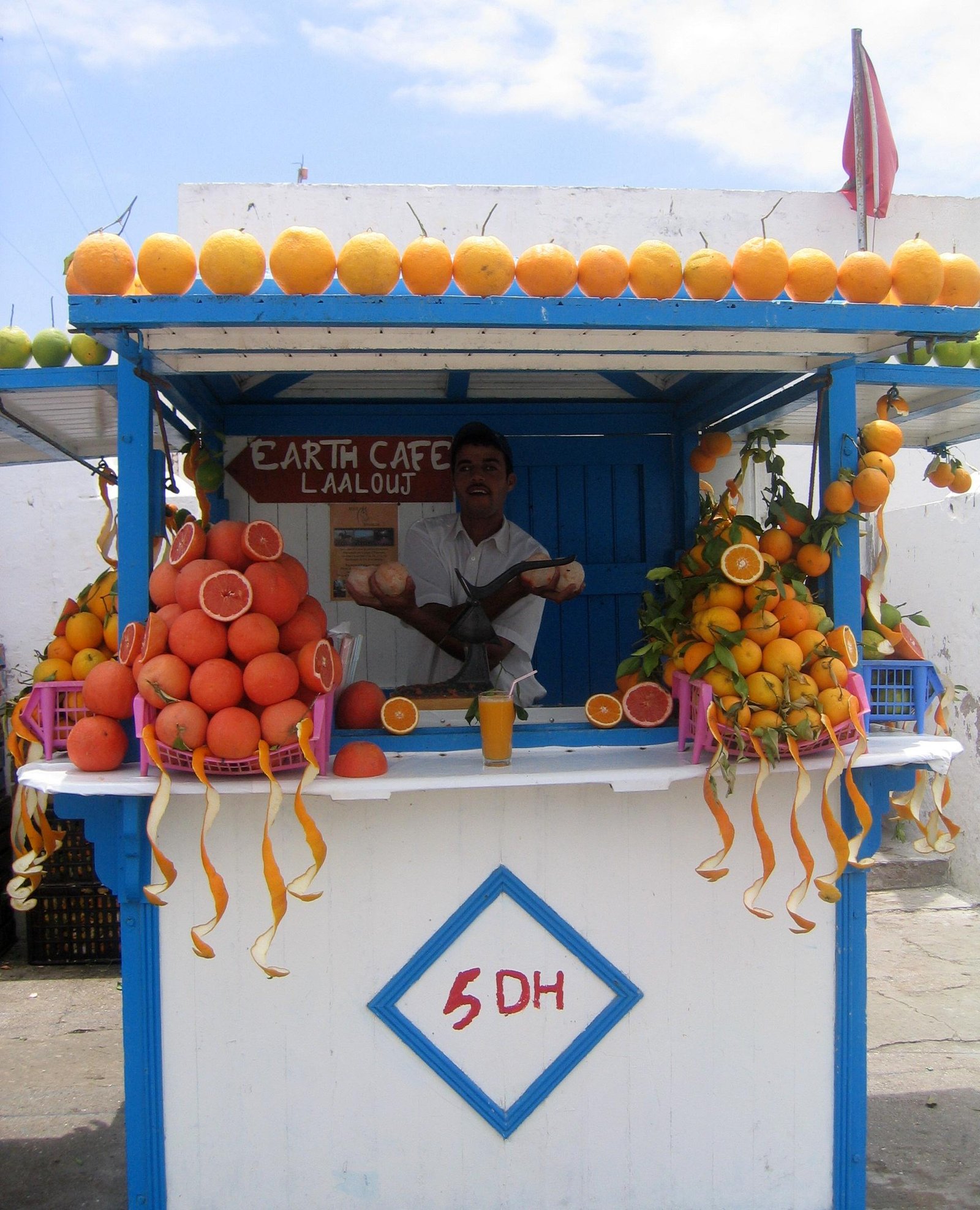 Orange juice cart on the streets of Essaouira, Morocco