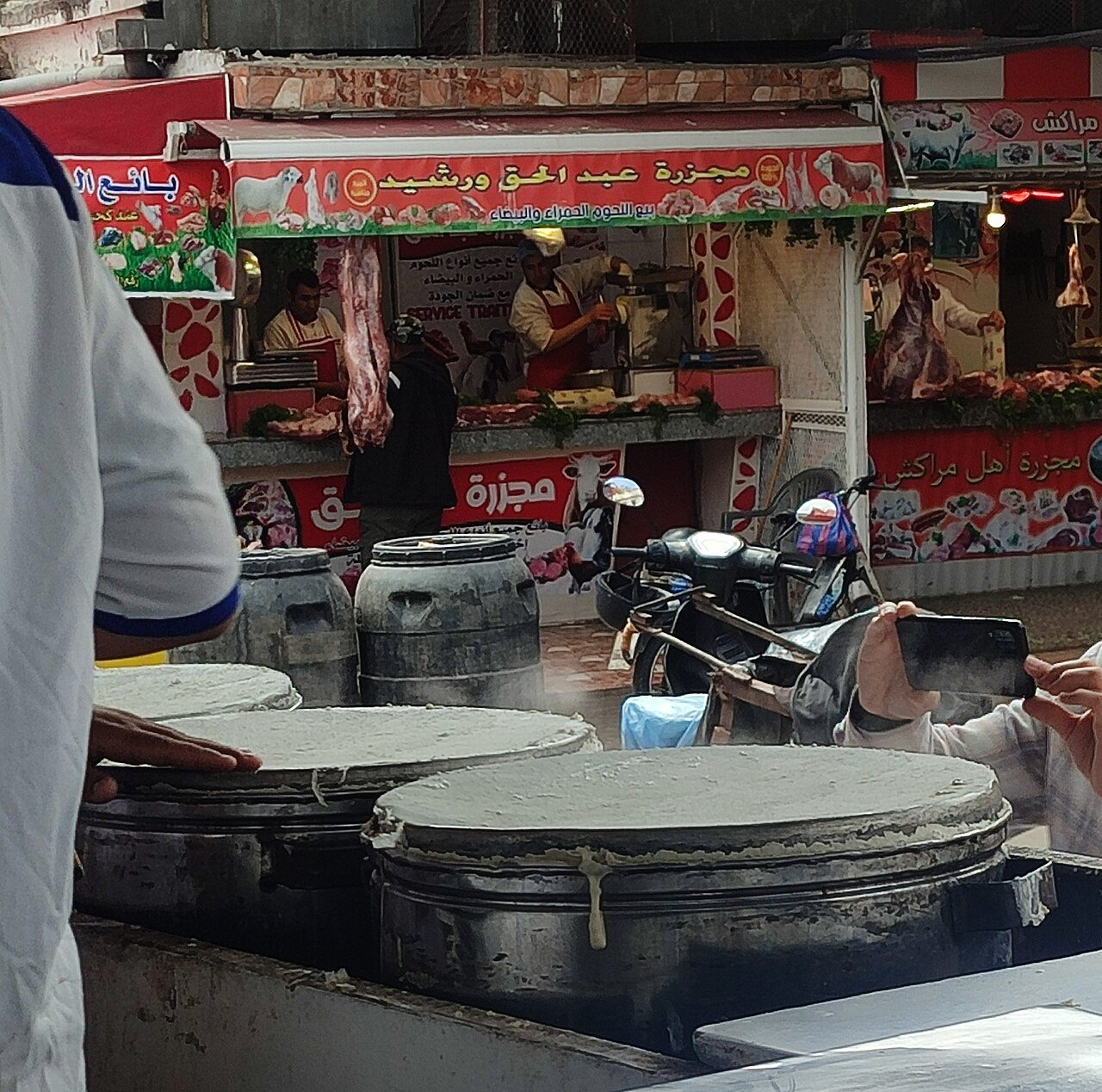Large round griddles at Souk Jmiaa in Casablanca where fresh warka pastry sheets for pastilla are made each morning