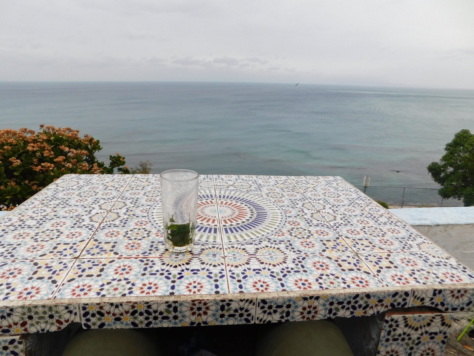 A café terrace in Tangier, Morocco, with a view over the water