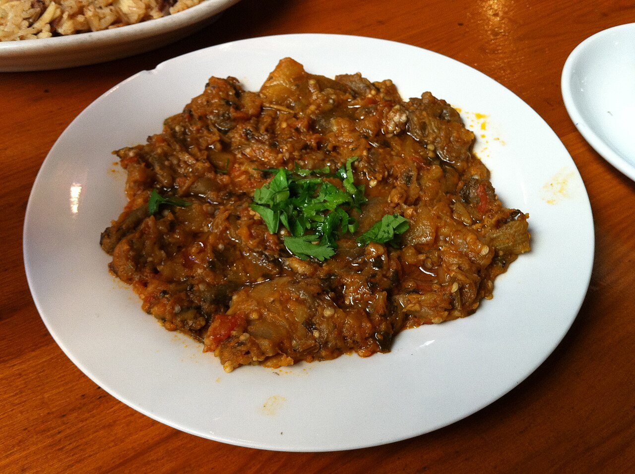 Zaalouk, Moroccan smoky mashed eggplant and tomato salad garnished with parsley